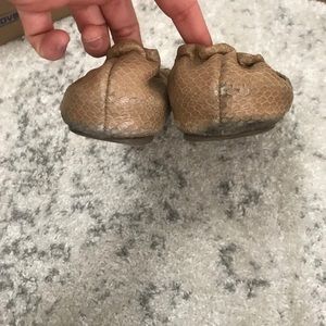 Gold and tan Tory Burch flats